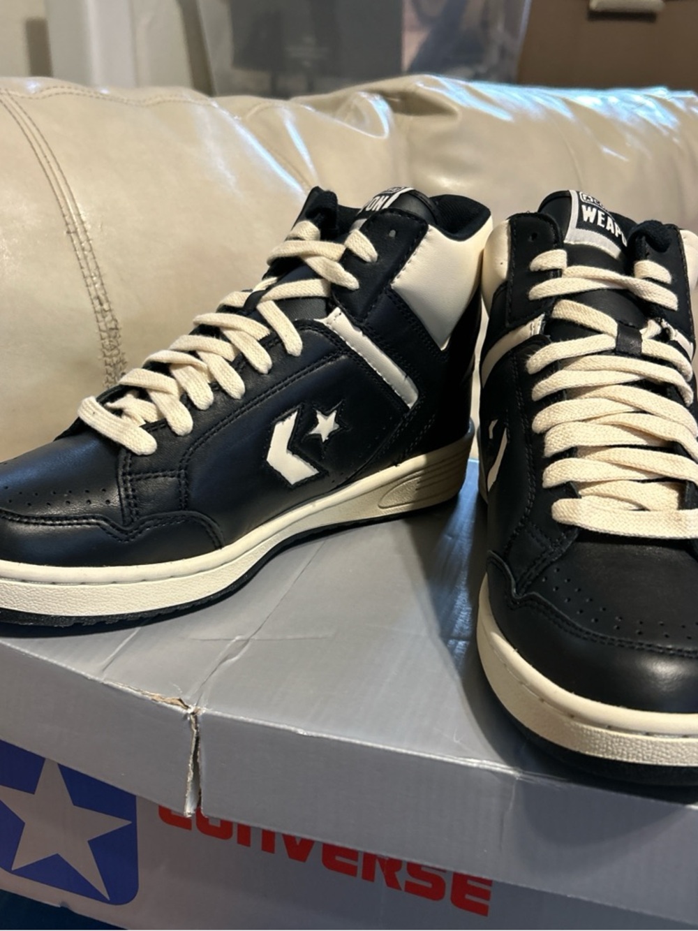 Converse Black and Cream High-Top Sneakers